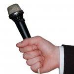 hand & mike hand and microphone